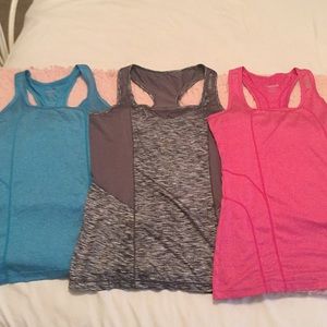 3 Reebok Silky soft workout Tanks EUC
